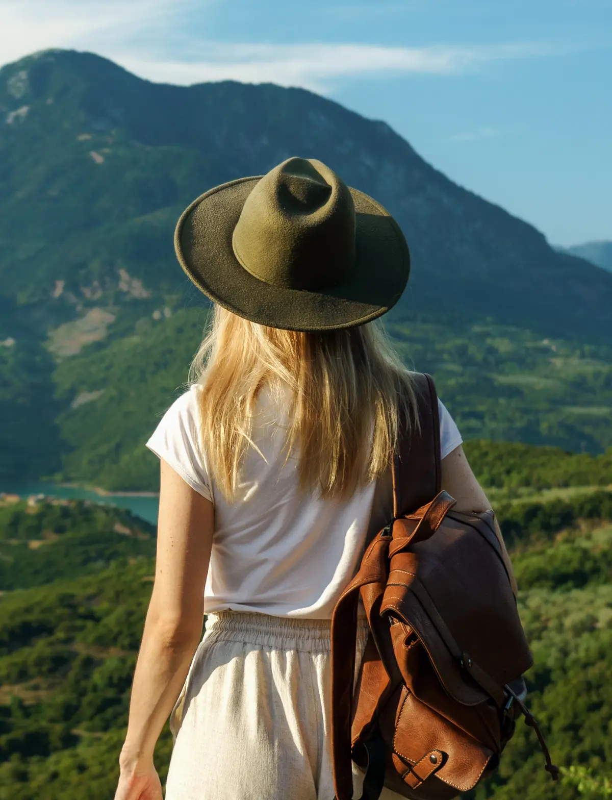Back view of woman with backpack